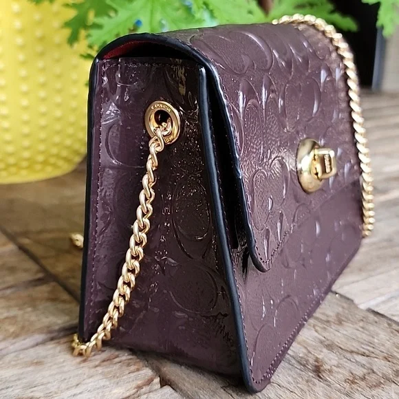 Coach Embossed Brown Crossbody Bag with Gold Chain